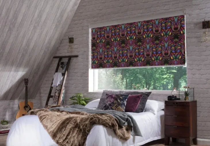 Colourful patterned pleated blind in a modern attic bedroom