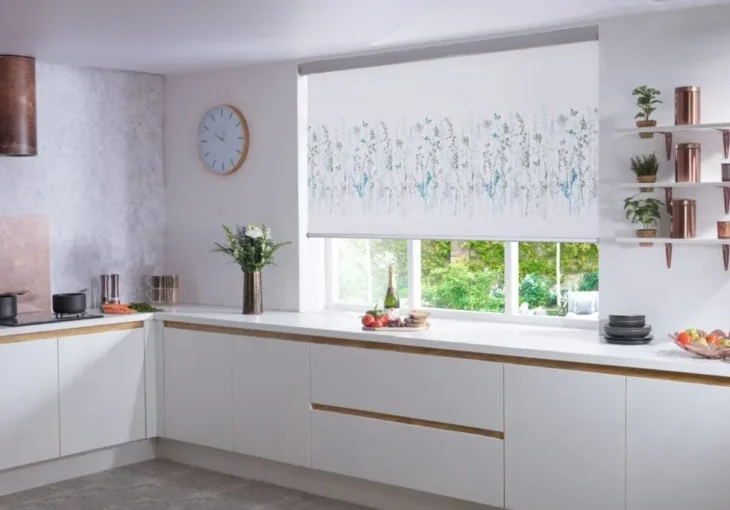 Modern kitchen with white roller blind featuring a floral pattern
